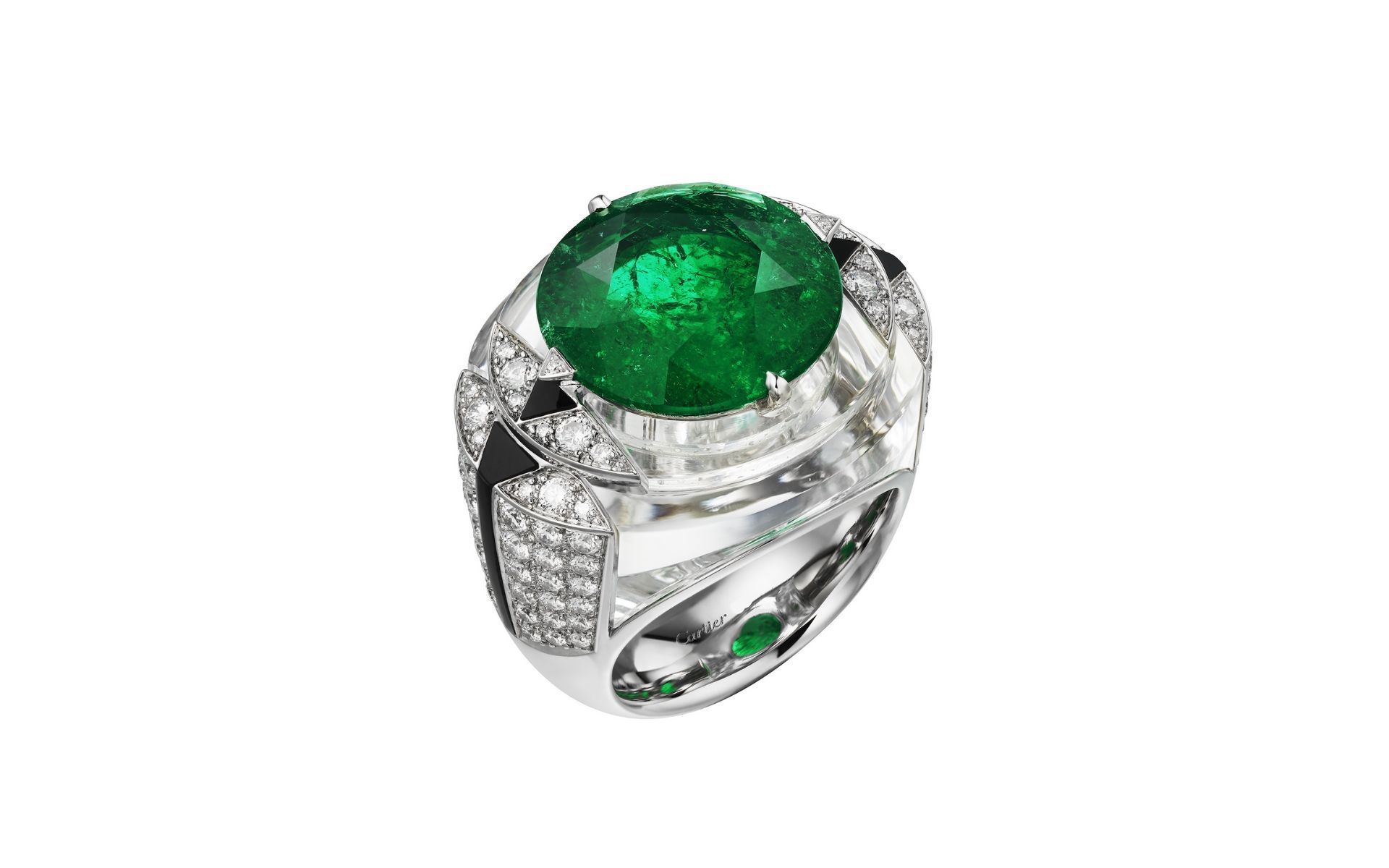 Give your outfit a boost with this emerald and diamond-embedded ring fit for a ball. (Photo credit: Cartier)
