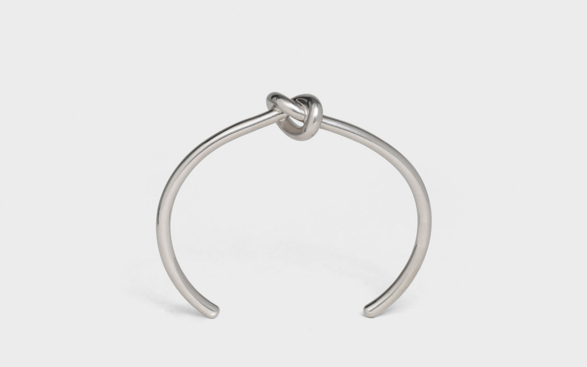 Slither into the night with this simple, yet stunning knot bracelet from Celine. Photo: Courtesy of Celine