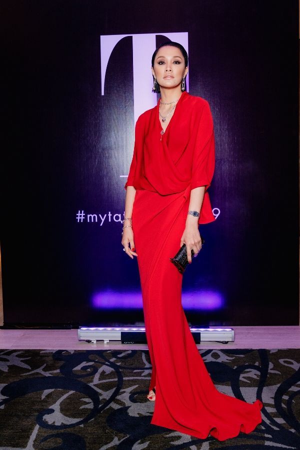 Scha Alyahya is a vision in red in a Carolina Herrera draped dress with jewellery by Tiffany & Co.