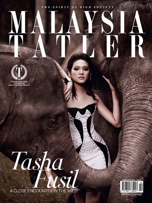 February 2012: What do Versace and wild elephants have in common? The ever-stylish Tasha Fusil takes on both in this incredible outdoor shoot in 2012. (Photo: Kim Mun)