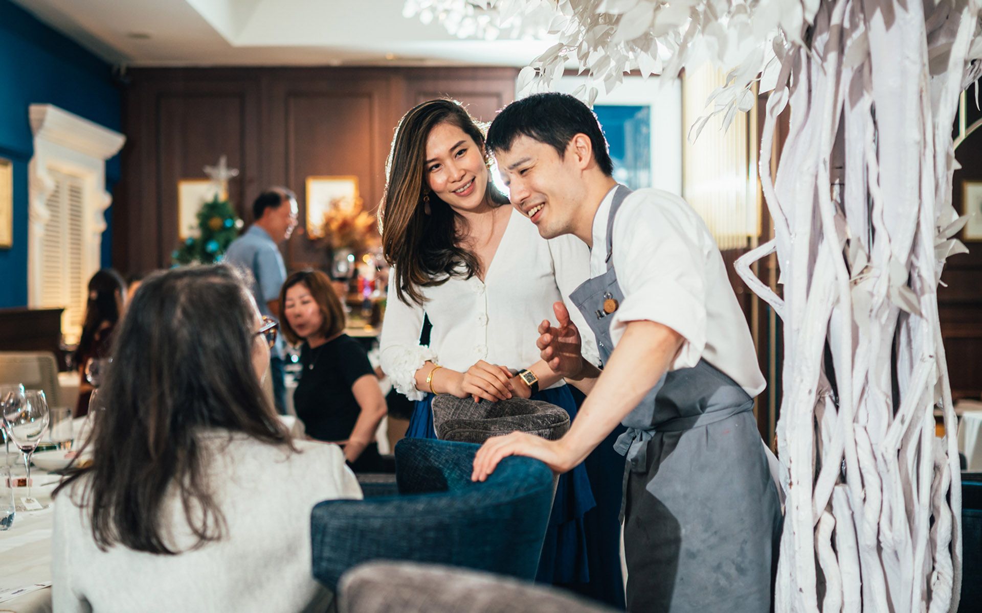 Chef Takuya Yamashita mingling with the guests