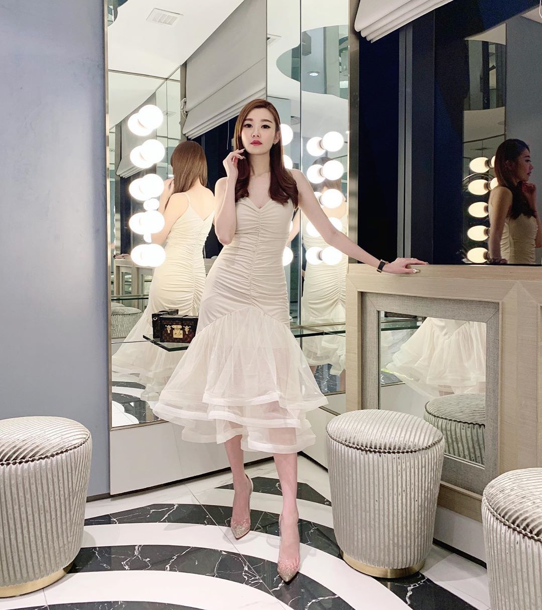 Wearing a frilly midi dress by Muse, Be Amused, Franklene Choong is officially ready for Valentine's Day dinner. (Photo: @franklene/Instagram)