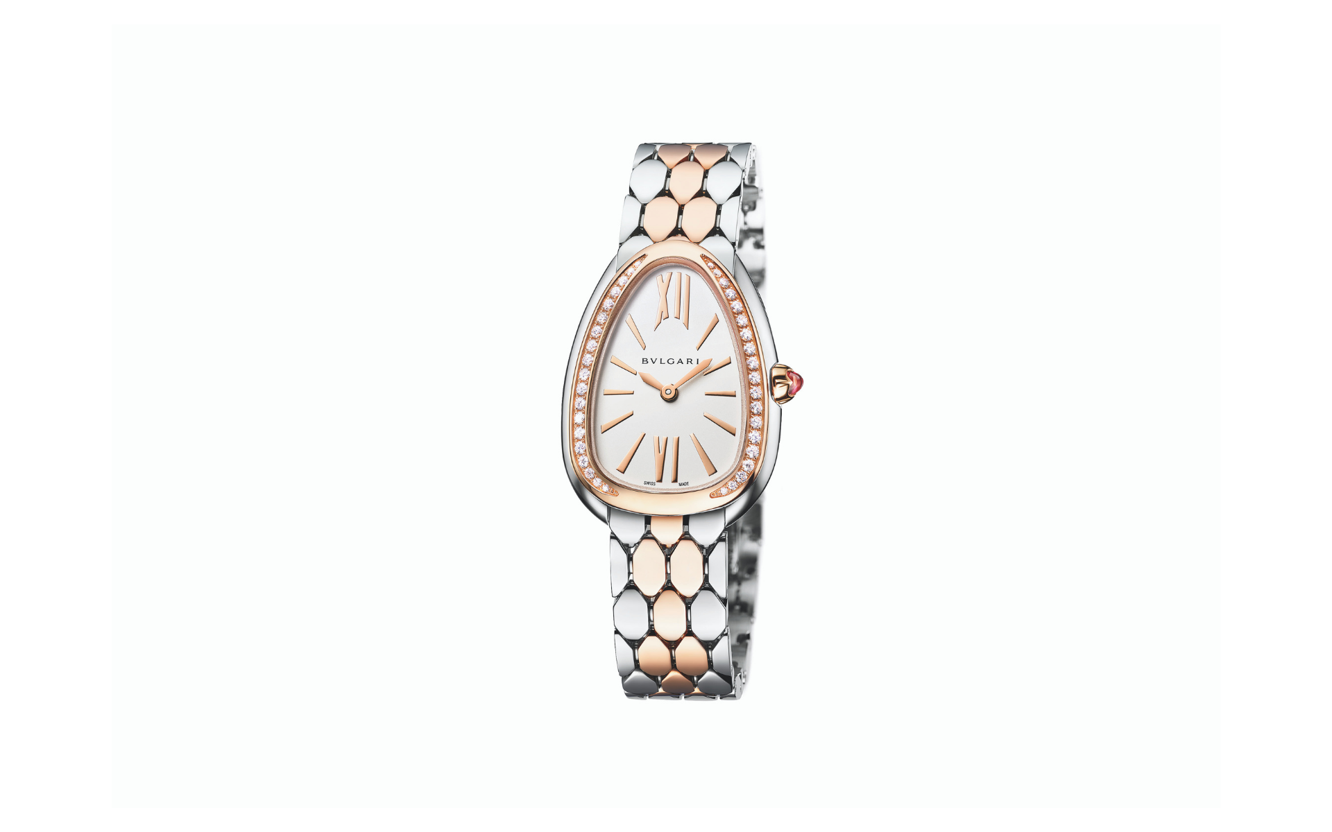 The Bulgari Serpenti Seduttori watch in stainless case and diamond-set 18k rose gold bezel with stainless steel and 18k rose gold bracelet is feminine and classic with a touch of boldness