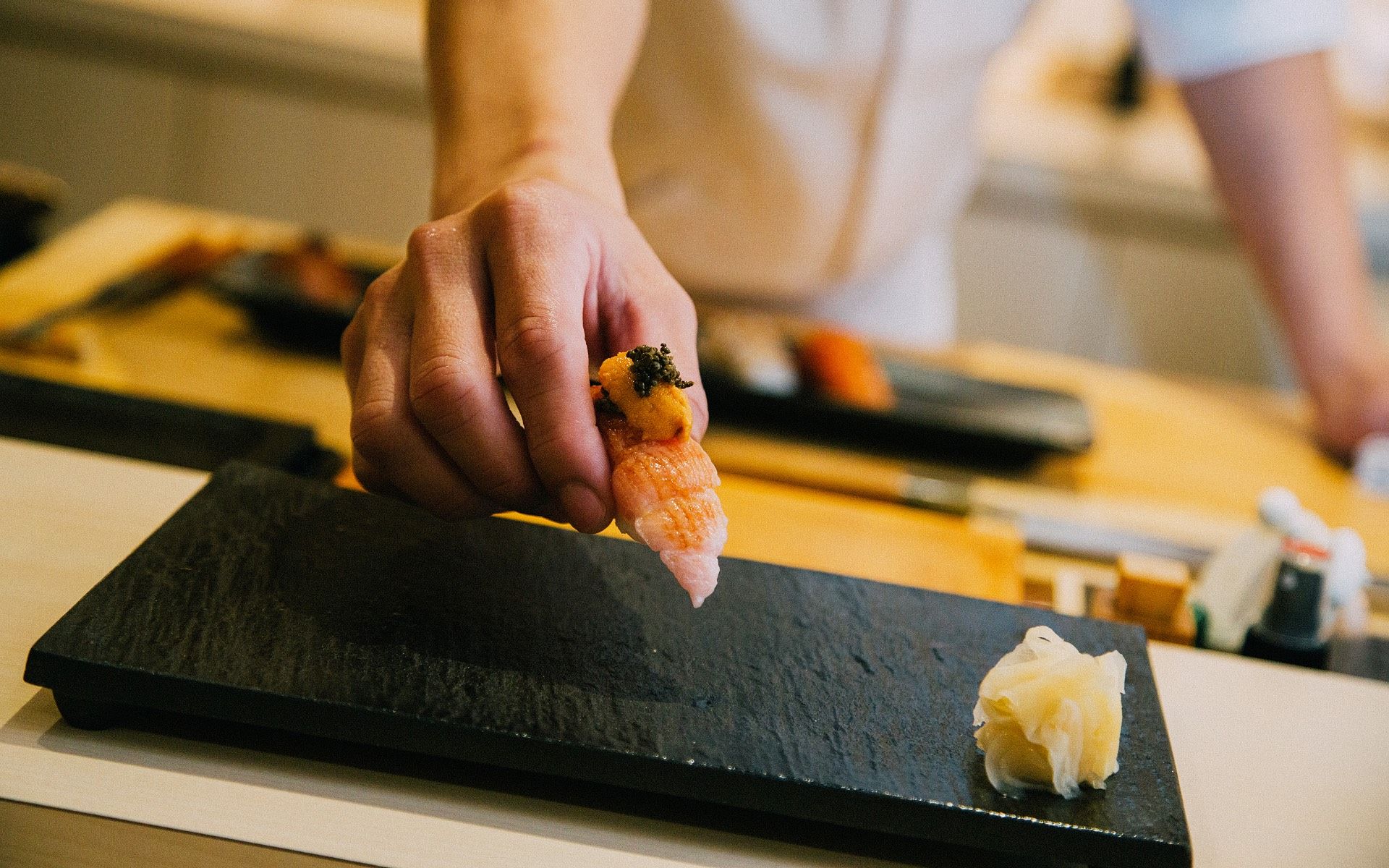 A double whammy of flavour: sea urchin and toro sushi (Photo: Khairul Imran / Tatler Malaysia)