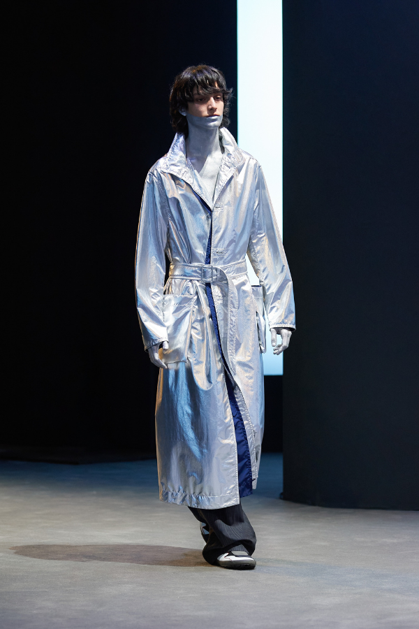 Old-school special effects with silver body paint to match the metallic trench coat