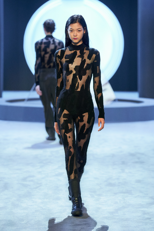 Interesting cut-outs in this skin-tight look, reminiscent of a scuba wet suit