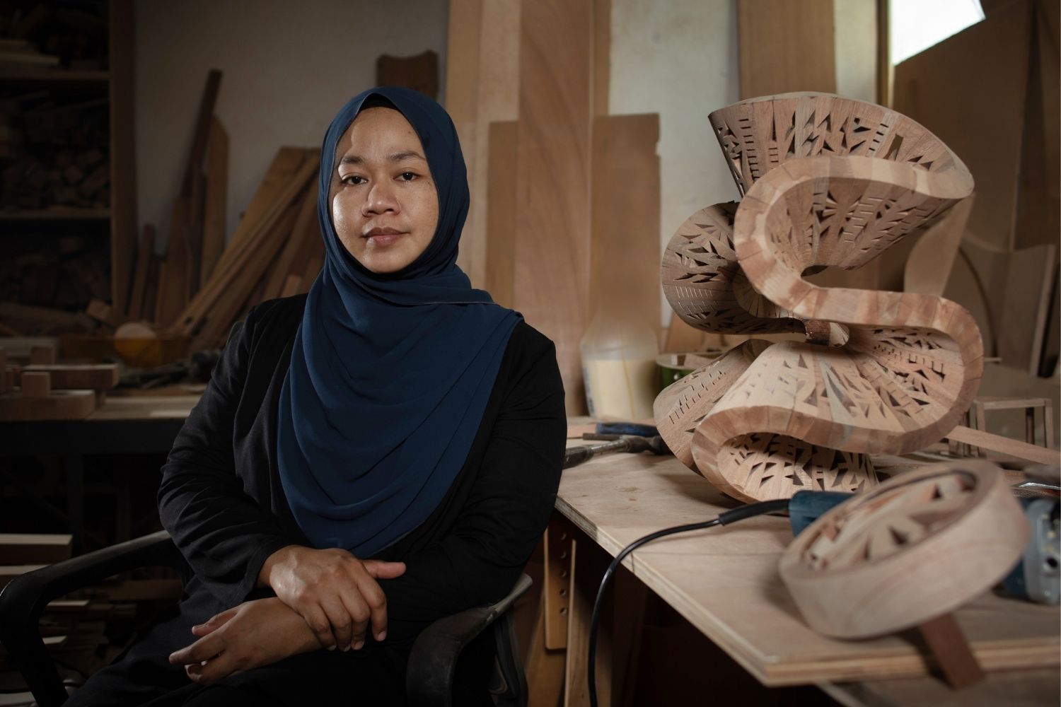 Sarawakian Artist Anniketyni Madian Sculpts Wood Into Stunning Works Of