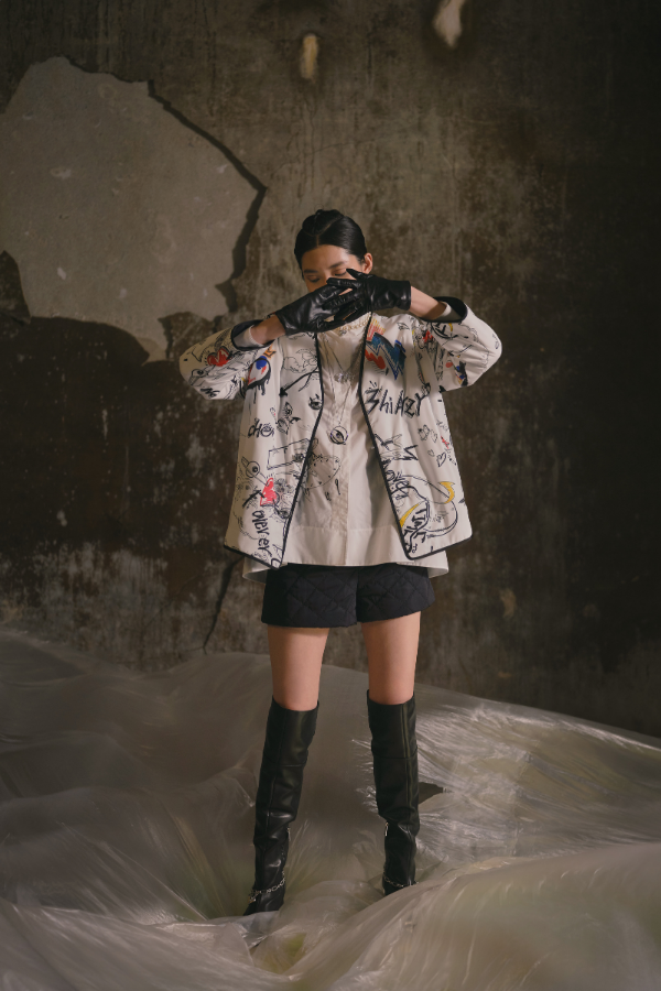 Lamb skin knee-length pants and a youthful jacket with exciting graphic logos