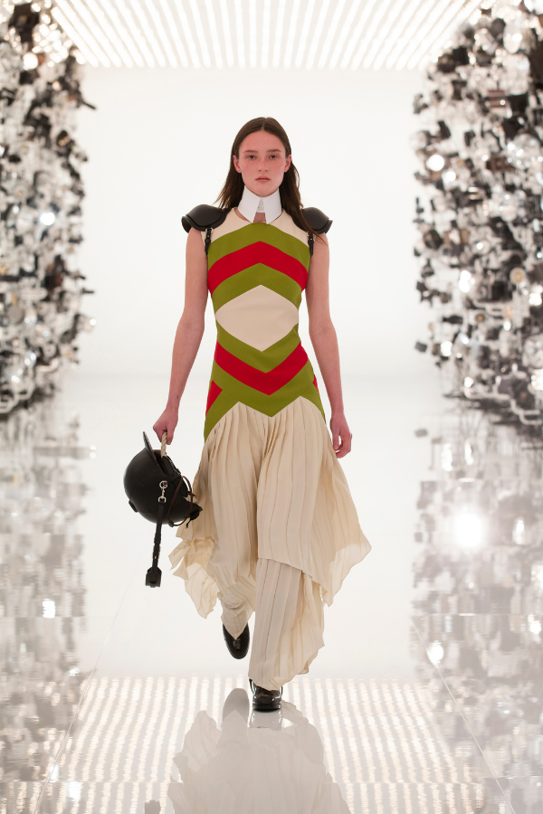 Gucci stripes reimagined on an eye-catching structured garment, with pleated detailing
