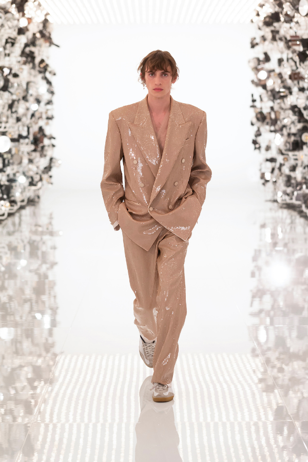 Sparkly synthetic fabric is one of the fun twists you will find on classic suits in this collection