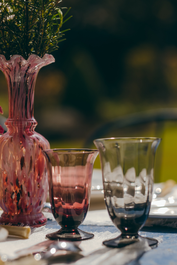 The Granville stemware features shades of amethyst, emerald and blue gray