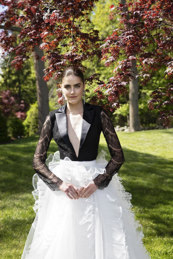 Steal the show with this full tulle gown that incorporates a lace-sleeved tuxedo bodice