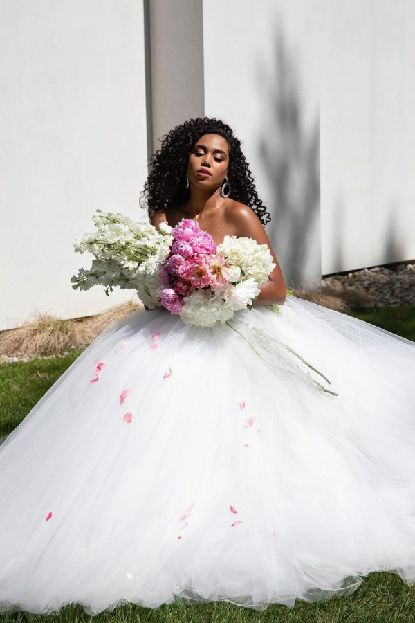 From fairytale dresses to simple slips, Christian Siriano plays with classic bridal fabrics, such as tulle, silk, taffeta and lace