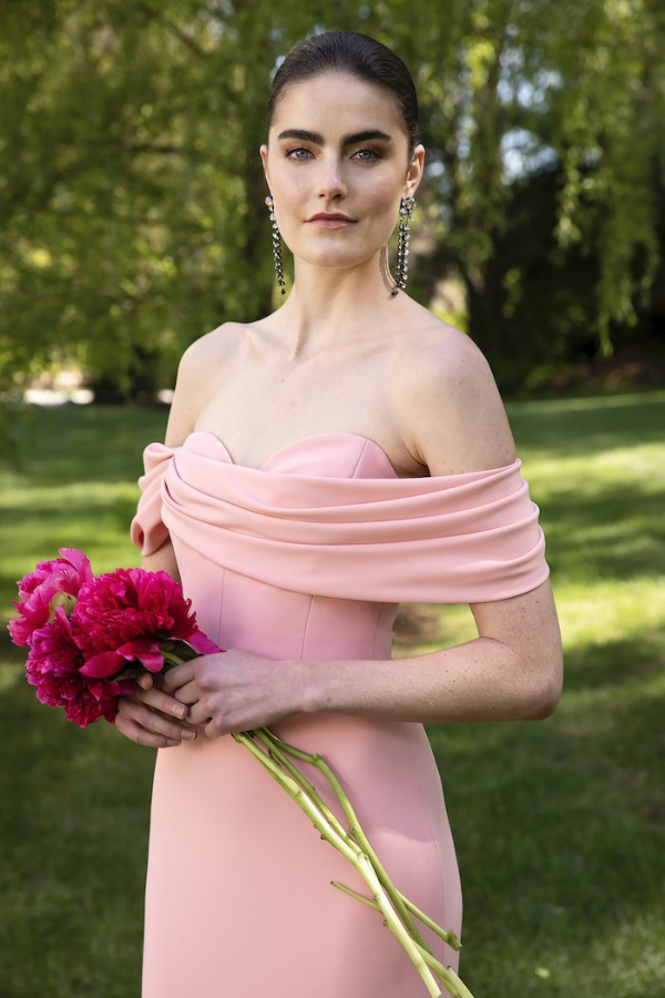 Pretty in pink: This crepe off-the-shoulder gown exudes understated elegance