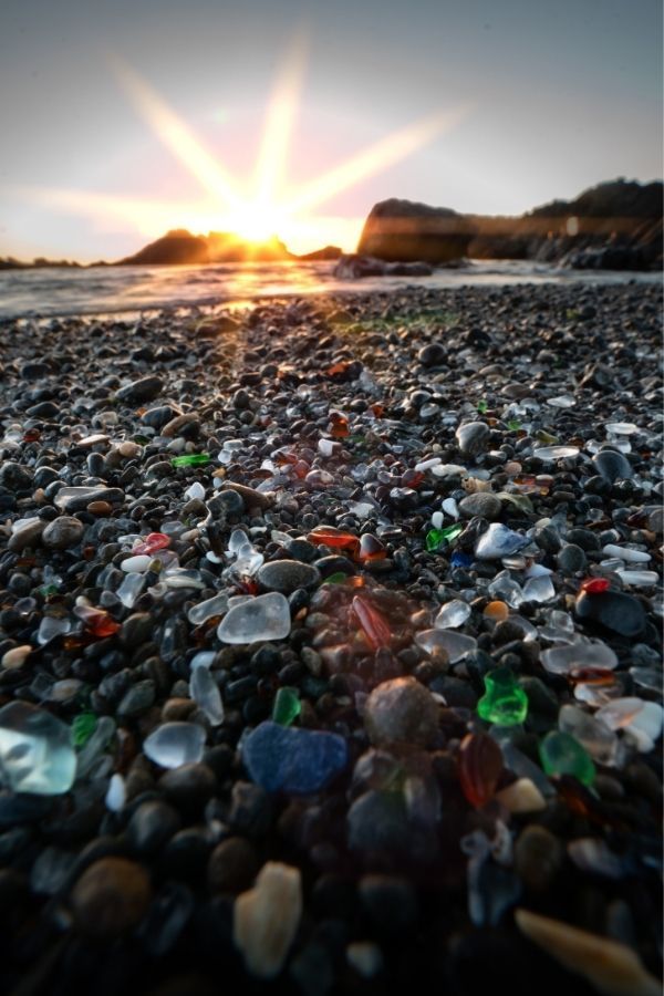 Ever heard of 'Glass Beach' in Fort Bragg, California? It is peppered with gem-like stones dredged up from discarded bottles, windows and other glass waste in the ocean over many, many years (Photo: Joshua Sortino/Unsplash)