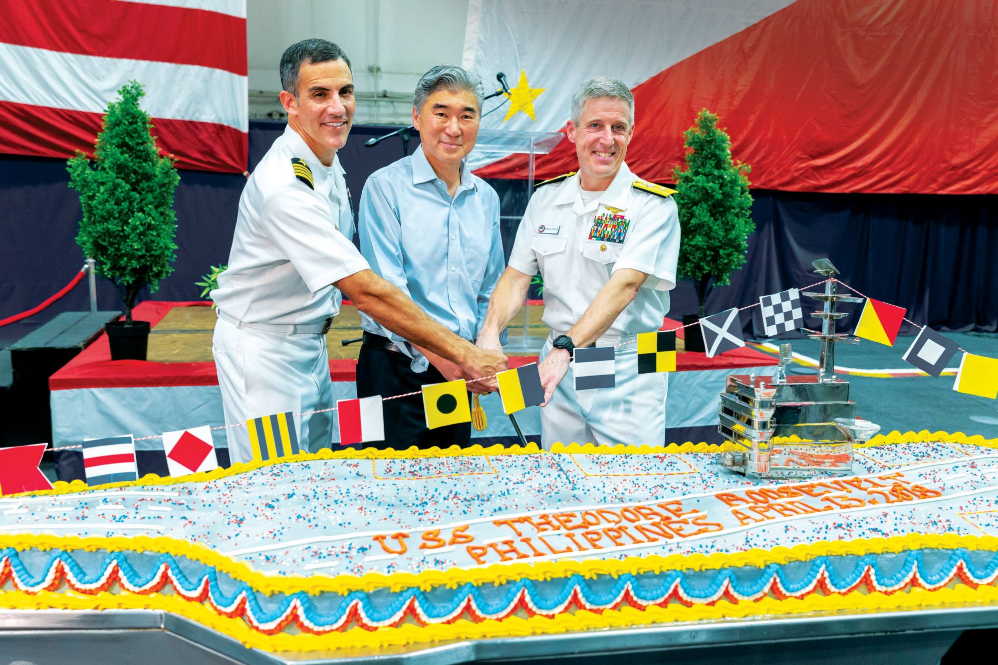 Captain Carlos Sardiello, Ambassador Sung Kim, and Rear Admiral Steve Koehler
