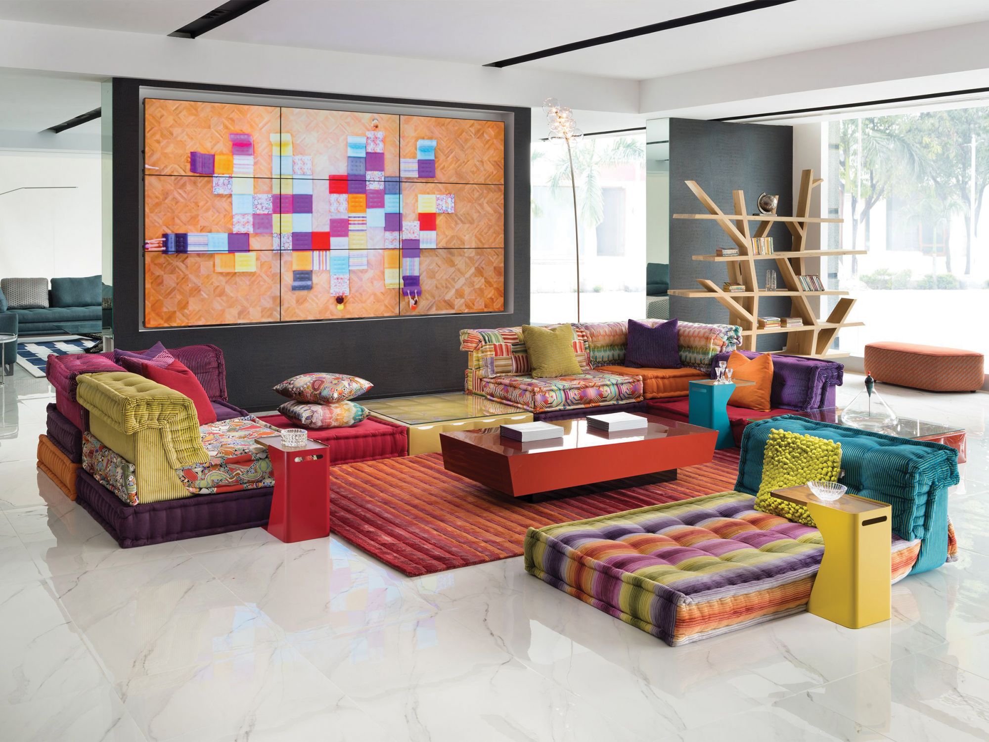 Originally created by the German designer Hans Hopfer in 1971, the colourful and modular Mah Jong sofa adds a sense of playfulness and fun to a sitting room. Available at Roche Bobois.