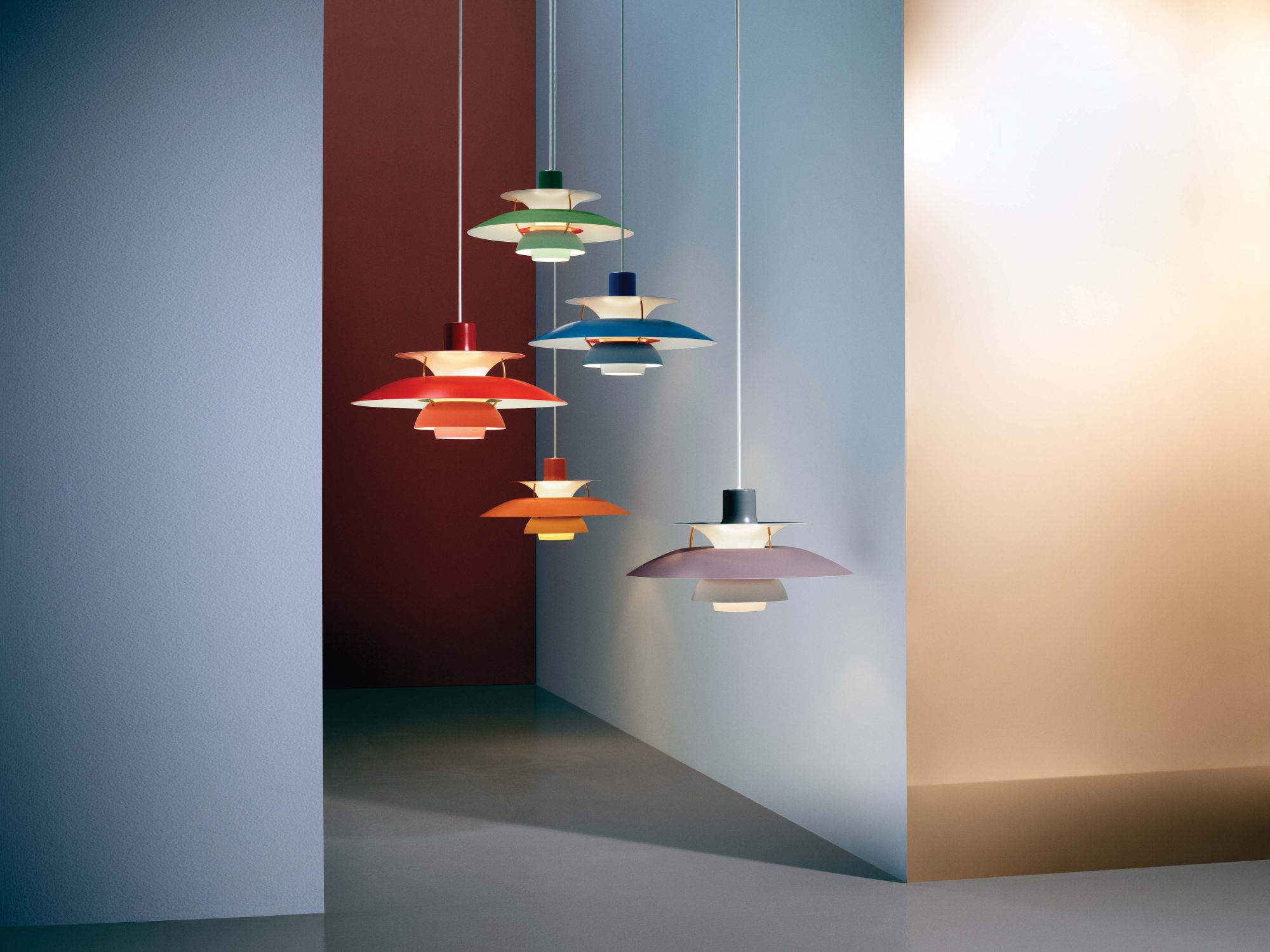 Poul Henningsen’s PH 5 pendant lamps for Louis Poulsen add a warm glow to a room. Available at Living Innovations.