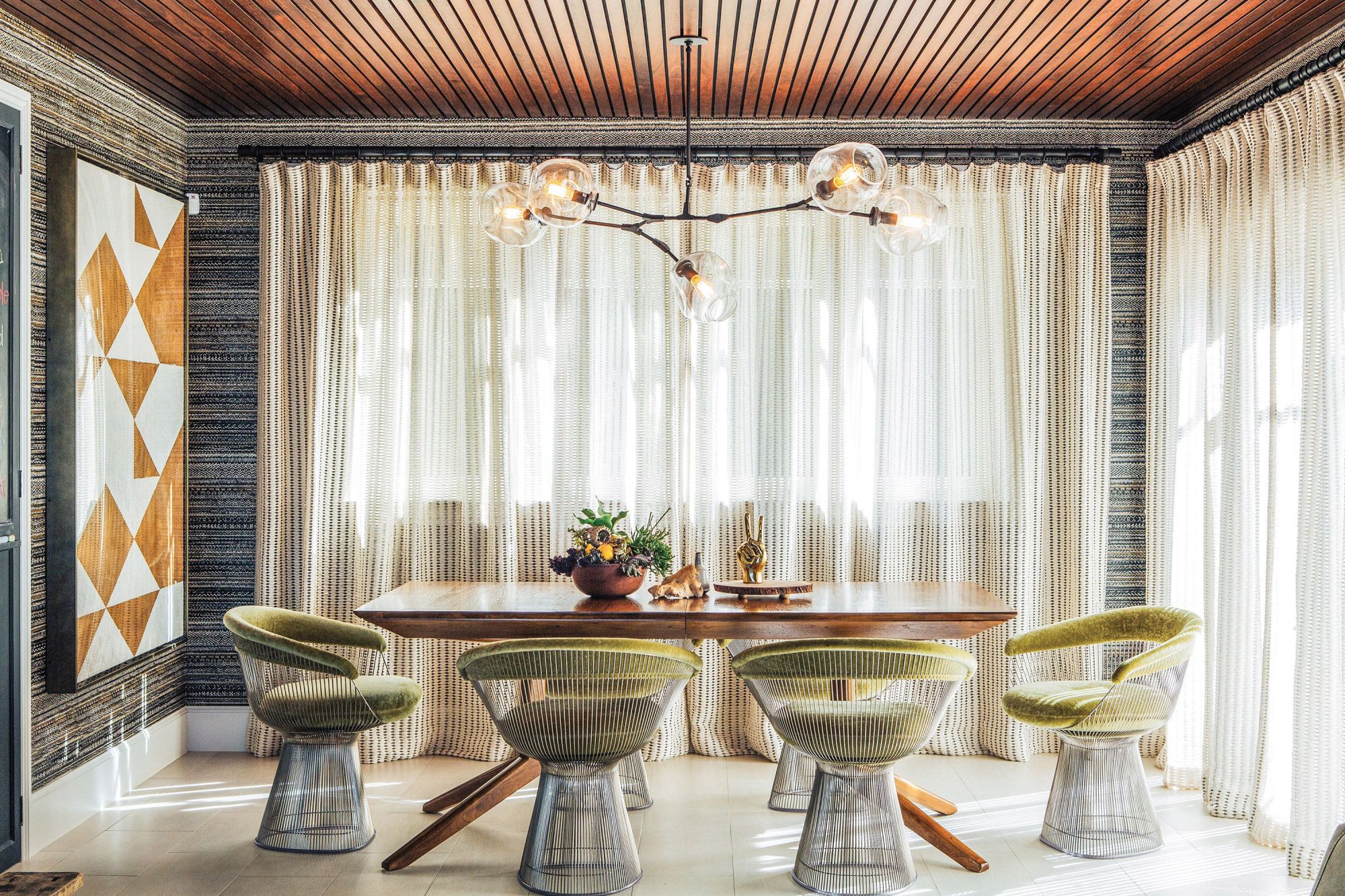 Walter Platner’s iconic wire-framed armchairs are a great addition to a dining room. Available at Knoll.