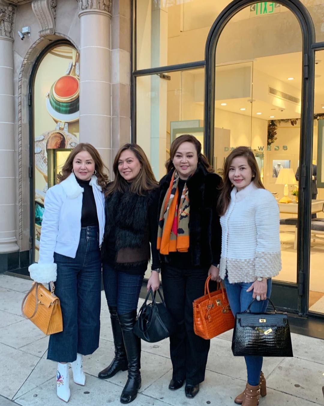 These stunning ladies pose for the camera as they stroll down Rodeo Drive. (@smalllaude)