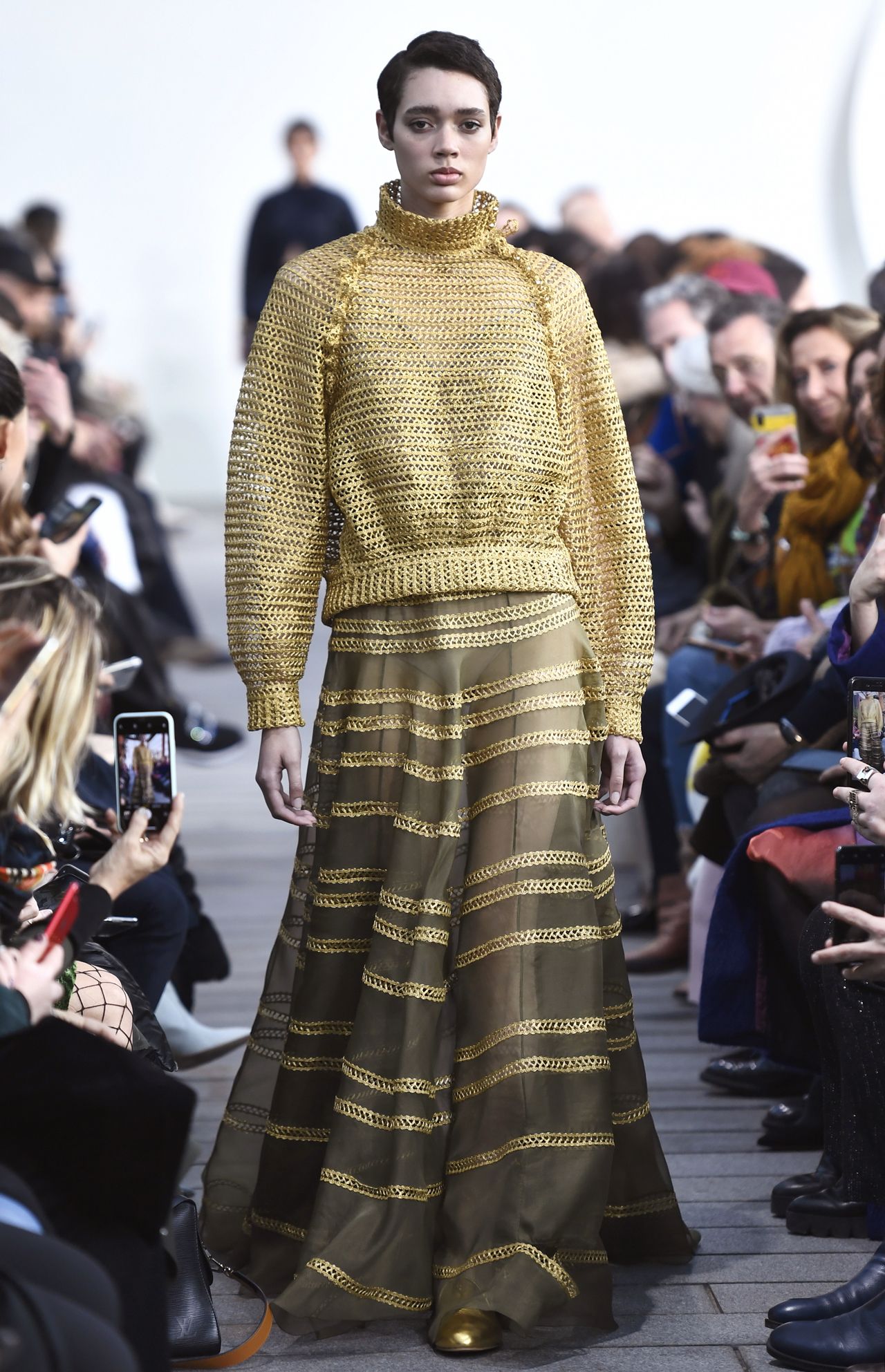 Gold was a key color in the haute couture collection by Maison Rabih Kayrouz, where it featured in every aspect of several delicate and refined outfits. Paris, January 21, 2019.