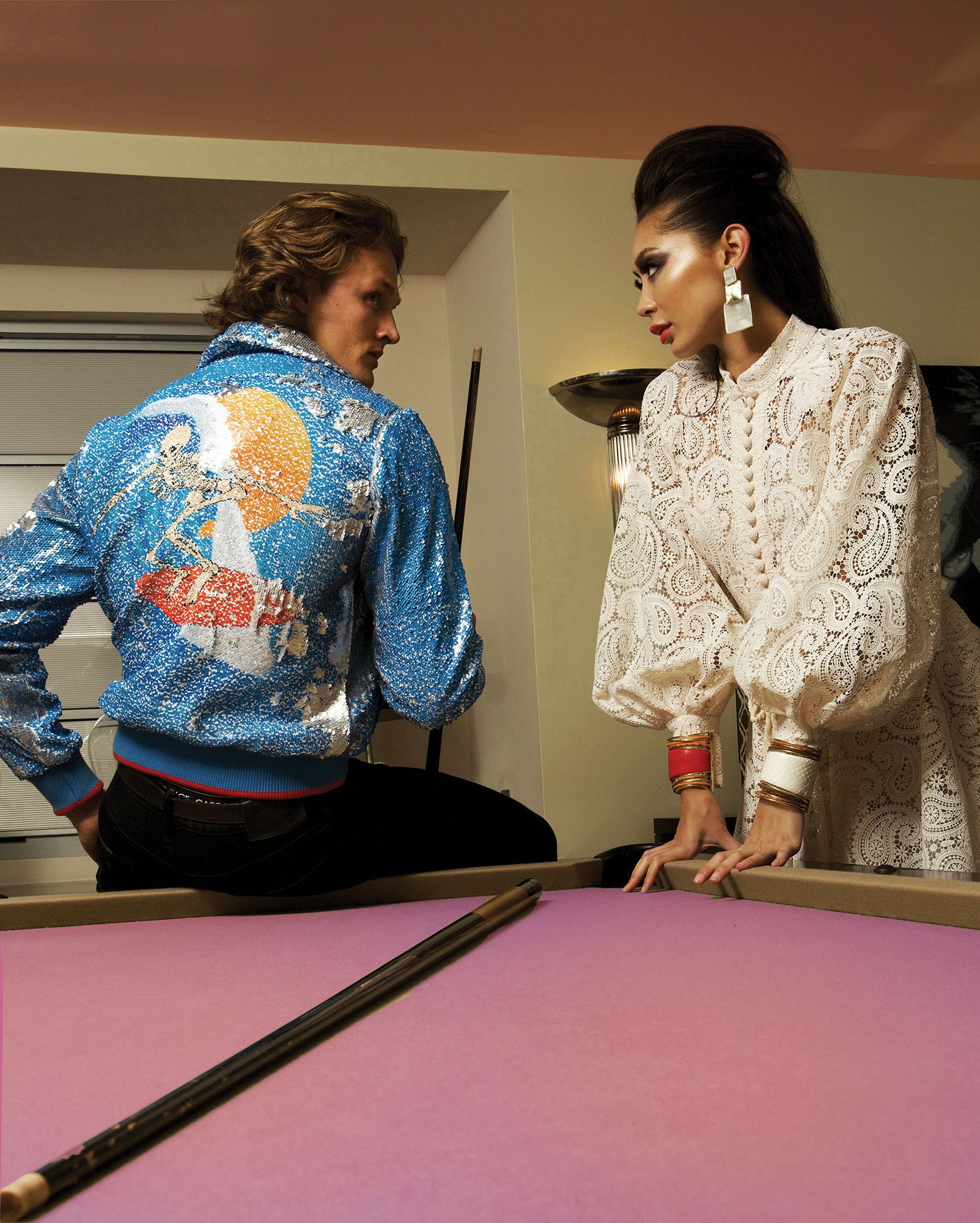 On Dylan: Bomber jacket by Ovadia & Sons, skinny jeans by DSQUARED2, sneakers by Onitsuka; on Alyssa: White lace dress by Zimmerman, accessories by Cristina Sabatini