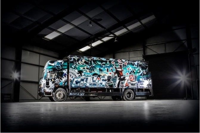 The vehicle features motifs that became over time Banksy's trademarks, including flying monkeys. | Image Courtesy of Bonhams
