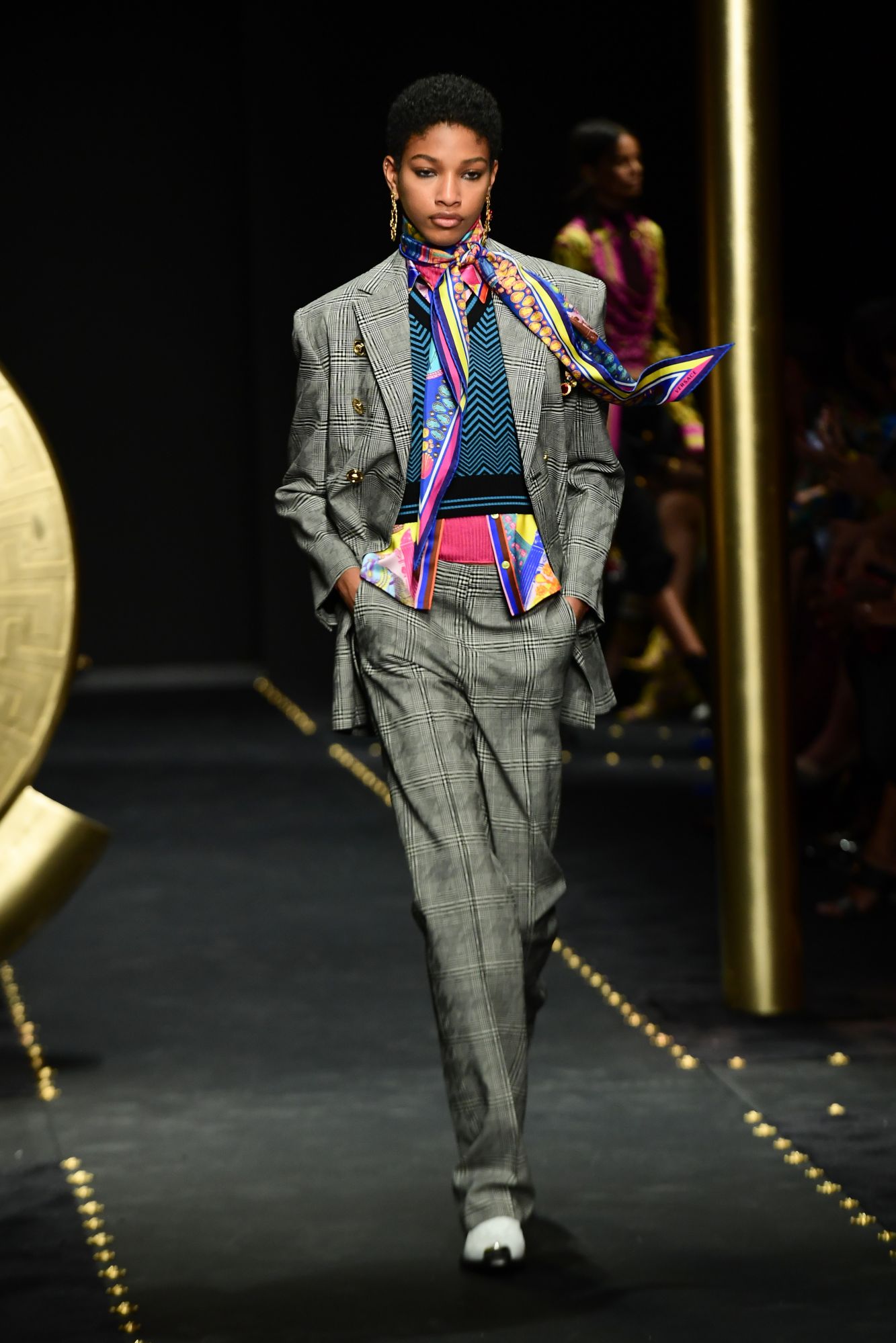 A model presents a creation during the Versace women's Fall/Winter 2019/2020 collection fashion show, on February 22, 2019 in Milan. (Photo by Miguel MEDINA / AFP)