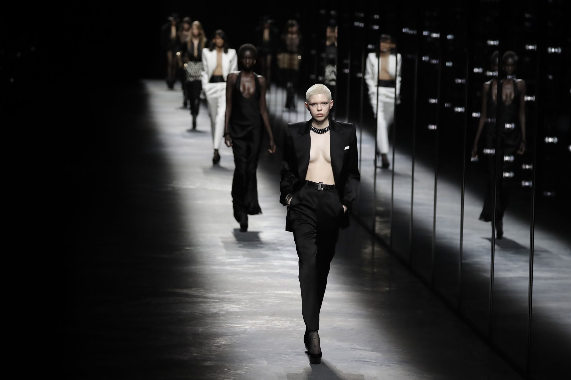 Models present creations by Saint Laurent during the Fall-Winter 2019/2020 Ready-to-Wear collection fashion show in Paris, on February 26, 2019. (Photo by Thomas SAMSON / AFP)