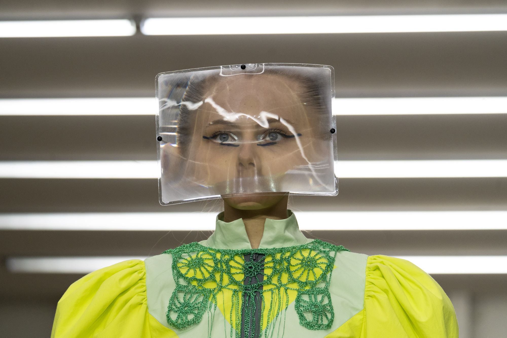 A model present creations from Britis designer Matty Bovan during a catwalk show for the Spring/Summer 2020 collection on the first day of London Fashion Week in London on September 13, 2019. (Photo by Niklas HALLE'N / AFP)