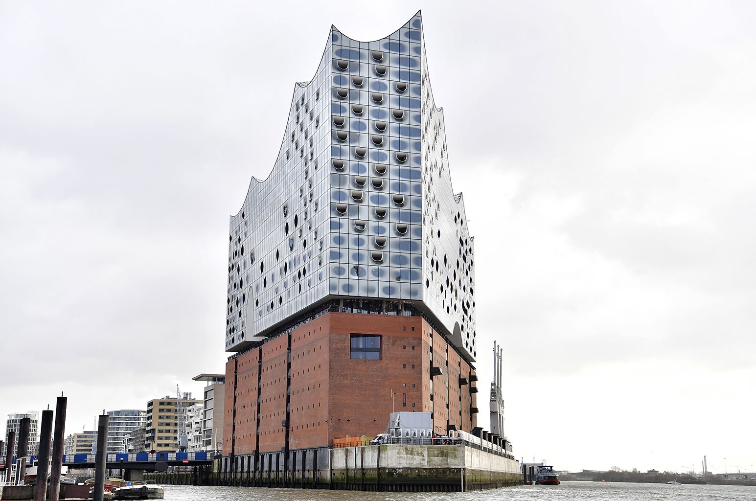 General view of the Elbphilharmonie concert hall taken on January 12, 2017 in Hamburg, northern Germany, on the morning after the opening concert and show of the new concert house.Around nine and a half years after laying the foundation stone, Germany premiered a spectacular new concert house on January 11, 2017 in Hamburg, nicknamed "Elphi" and billed as a future national landmark and global attraction, albeit after a cost explosion. / AFP PHOTO / John MACDOUGALL