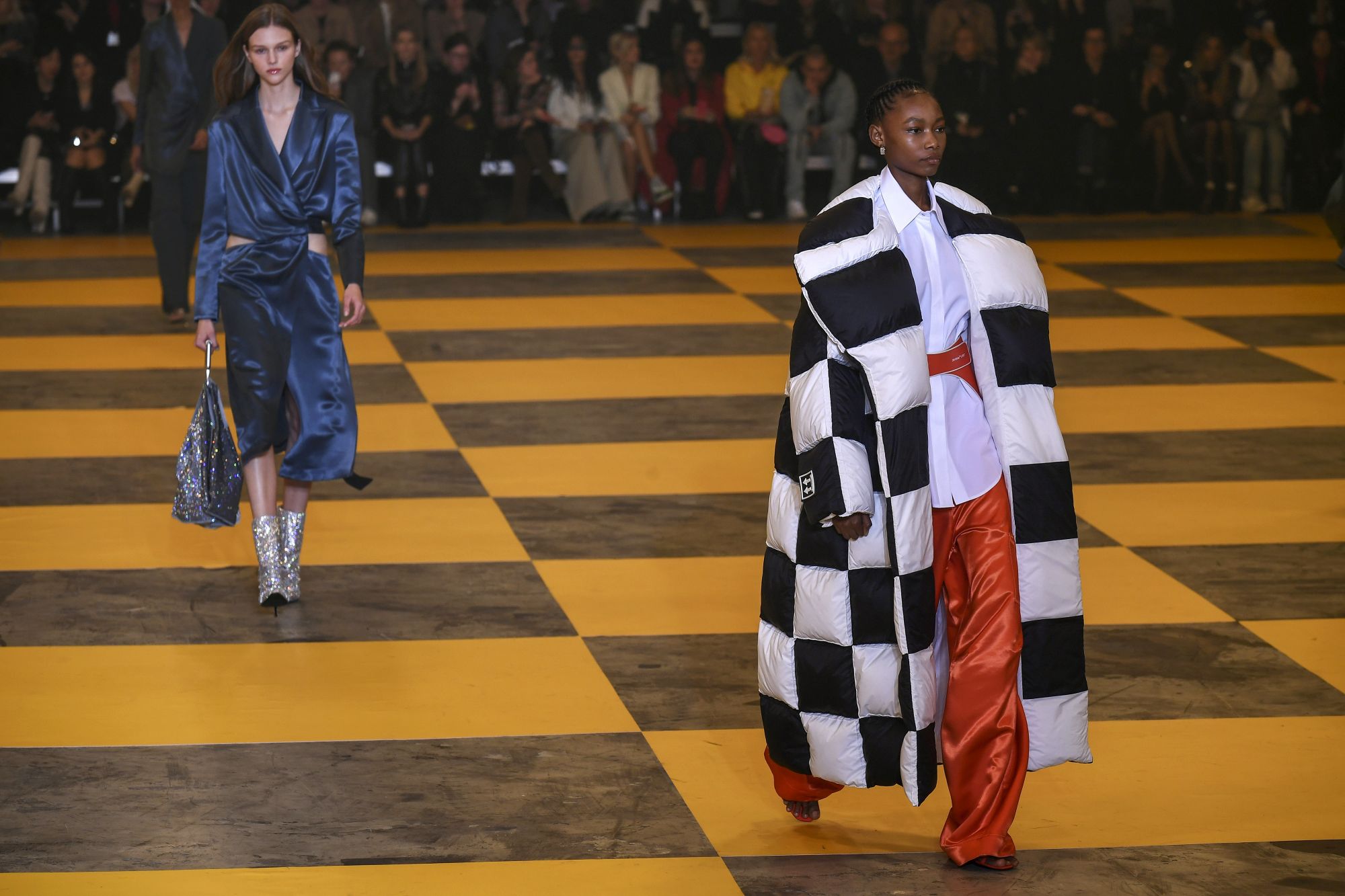 Models present creations by Off-White during the Women's Fall-Winter 2019/2020 Ready-to-Wear collection fashion show in Paris, on February 28, 2019. (Photo by Philippe LOPEZ / AFP)