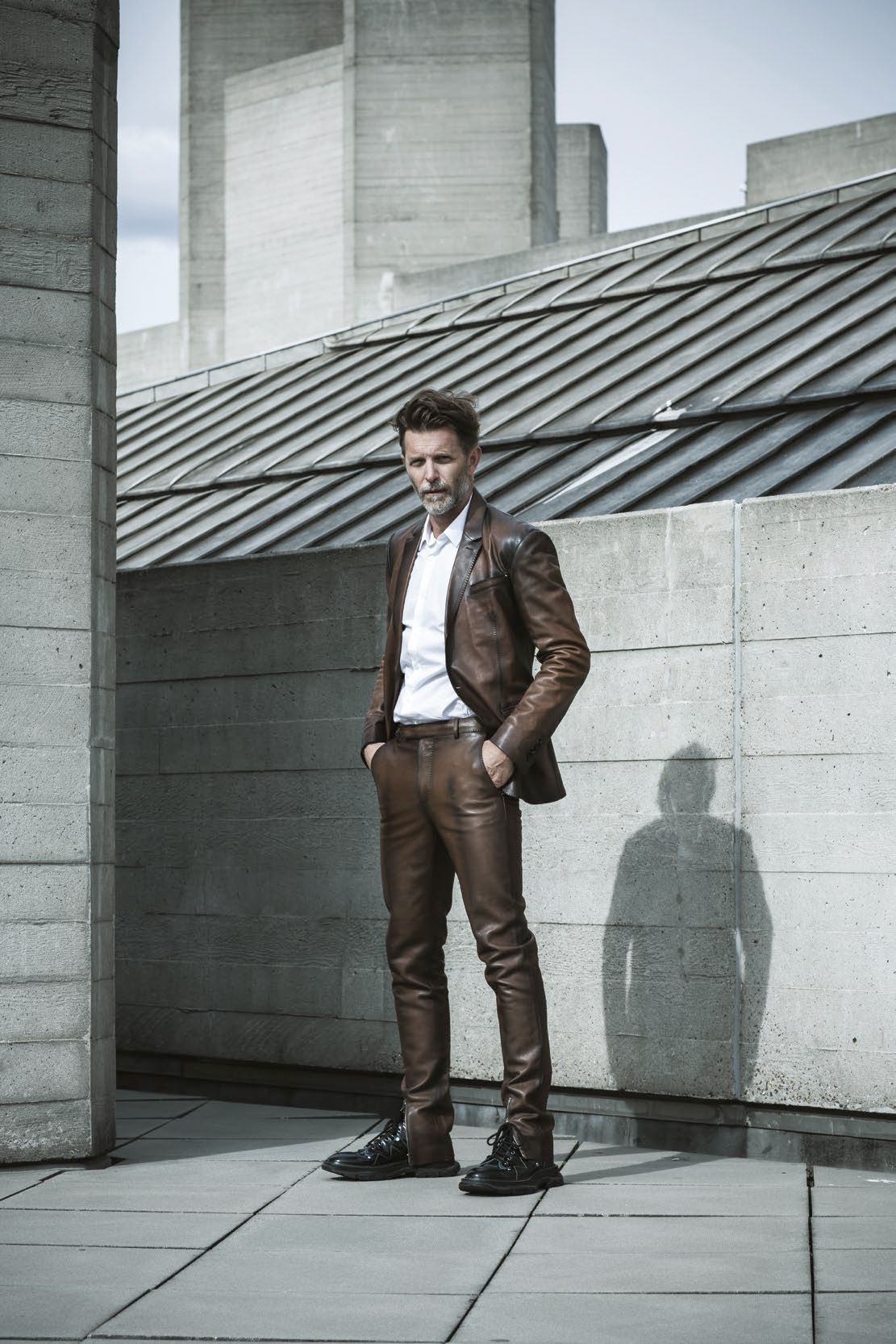 Suit by Berluti, shirt by Fendi, boots by Alexander McQueen