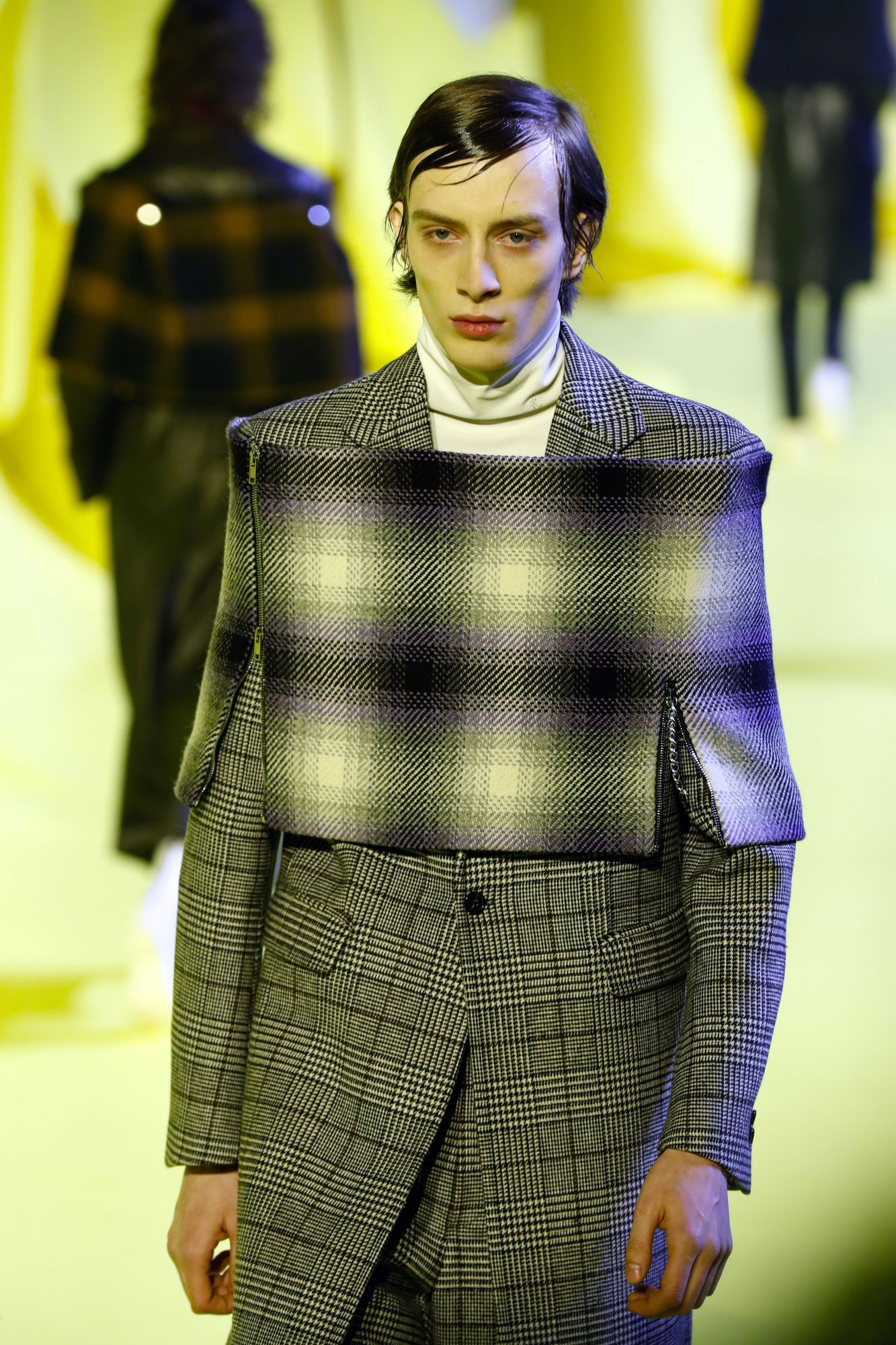 A model presents a creation by Raf Simons during the men fall-winter 2020-2021 fashion shows in Paris on January 15, 2020. (Photo by FRANCOIS GUILLOT / AFP)