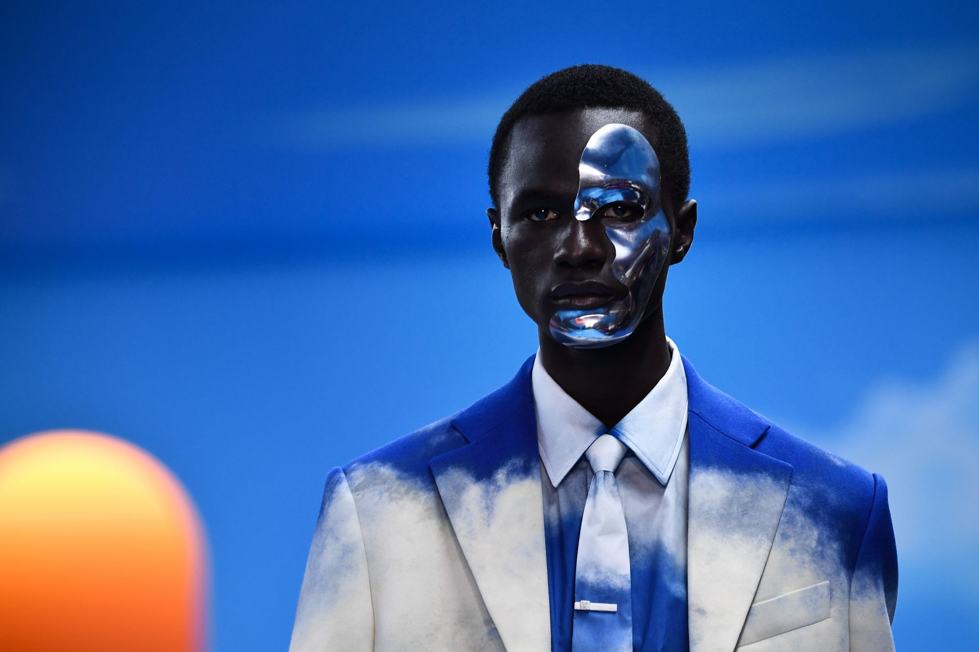 A model presents a creation by Louis Vuitton, during the men's Fall/Winter 2020/2021 collection fashion show in Paris on January 16, 2020. (Photo by Anne-Christine POUJOULAT / AFP)