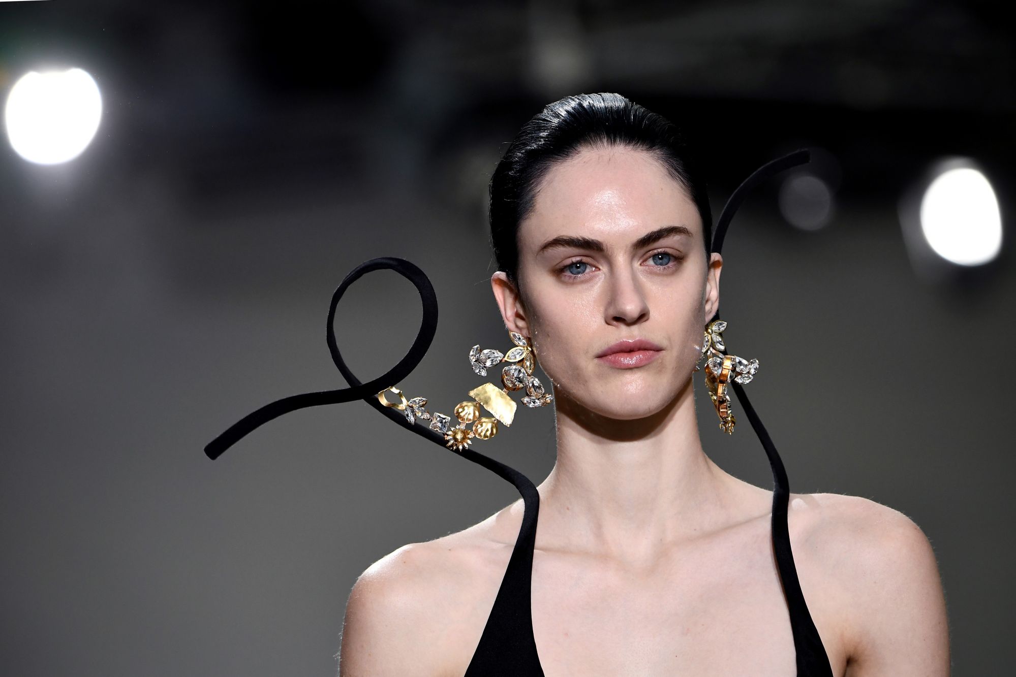A model presents a creation for Schiaparelli during the Women's Spring-Summer 2020/2021 Haute Couture collection fashion show in Paris, on January 20, 2020. (Photo by Anne-Christine POUJOULAT / AFP)