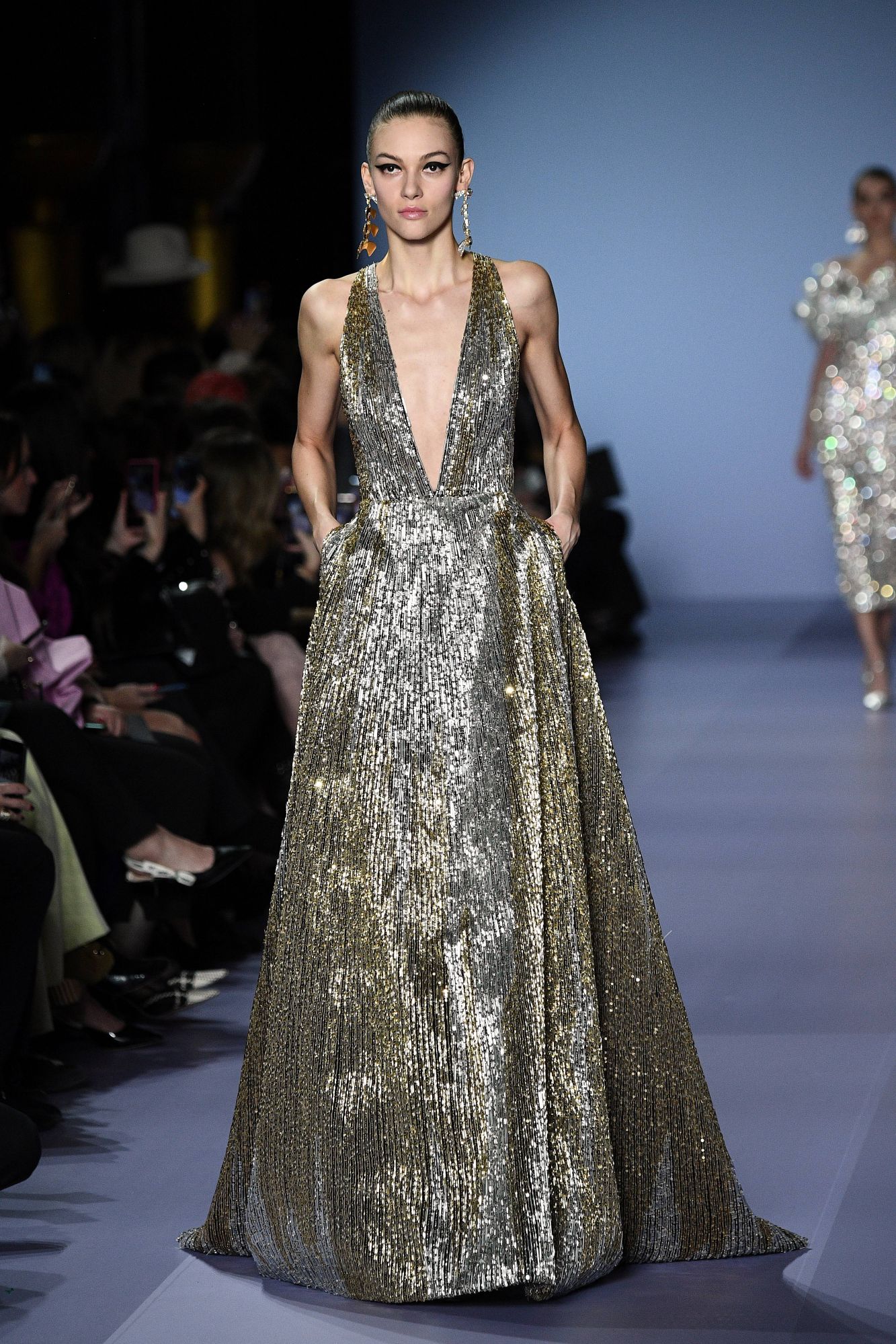 A model presents a creation by Georges Hobeika during the Women's Spring-Summer 2020/2021 Haute Couture collection fashion show in Paris, on January 20, 2020. (Photo by Anne-Christine POUJOULAT / AFP)