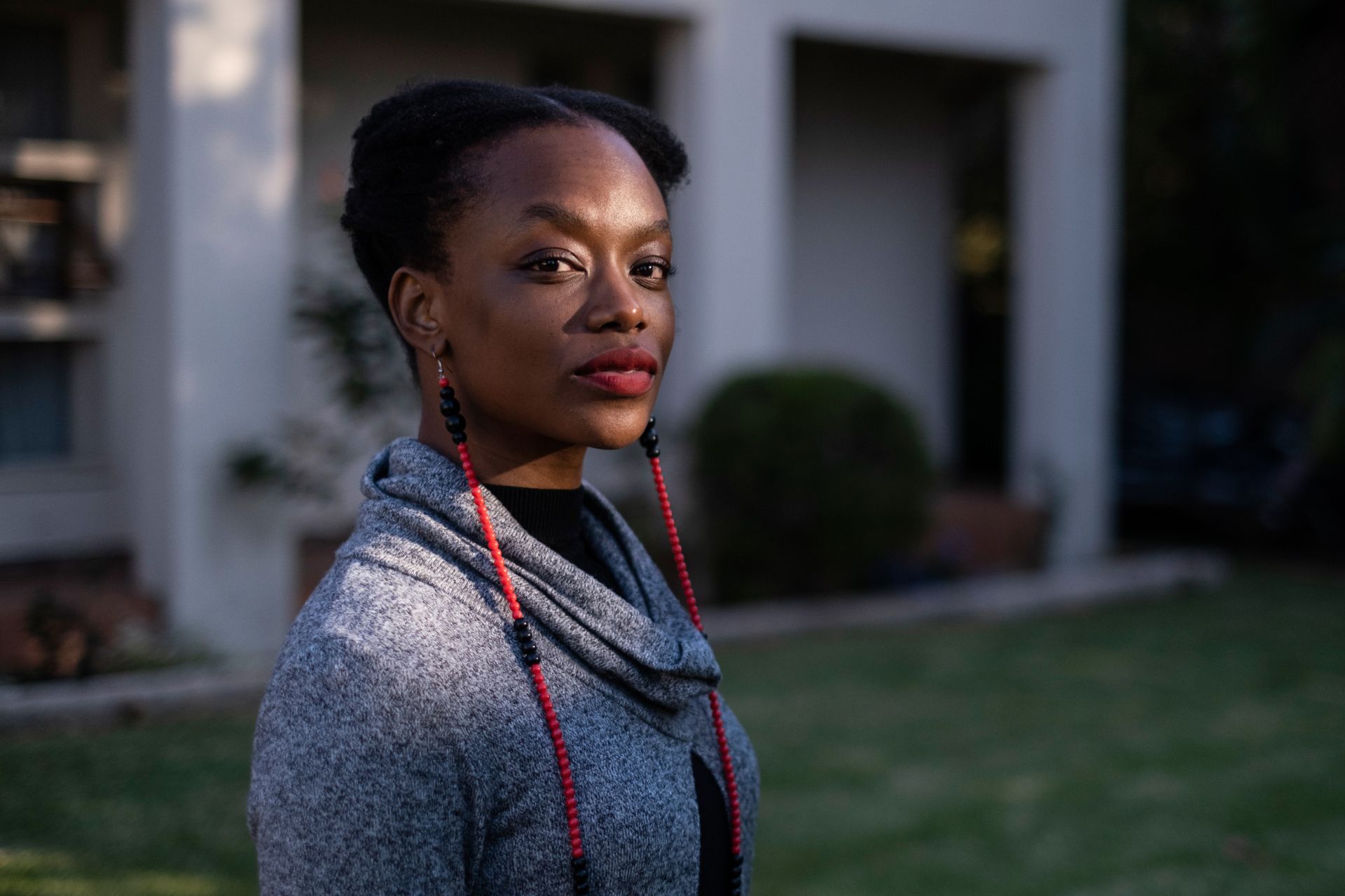 Tendaiishe Chitima, the lead actress in the Zimbabwean film Cook Off, poses for a portrait at her home in Sandton on May 28, 2020. - Cook Off will be available to stream on Netflix on June 1, 2020. (Photo by WIKUS DE WET / AFP)