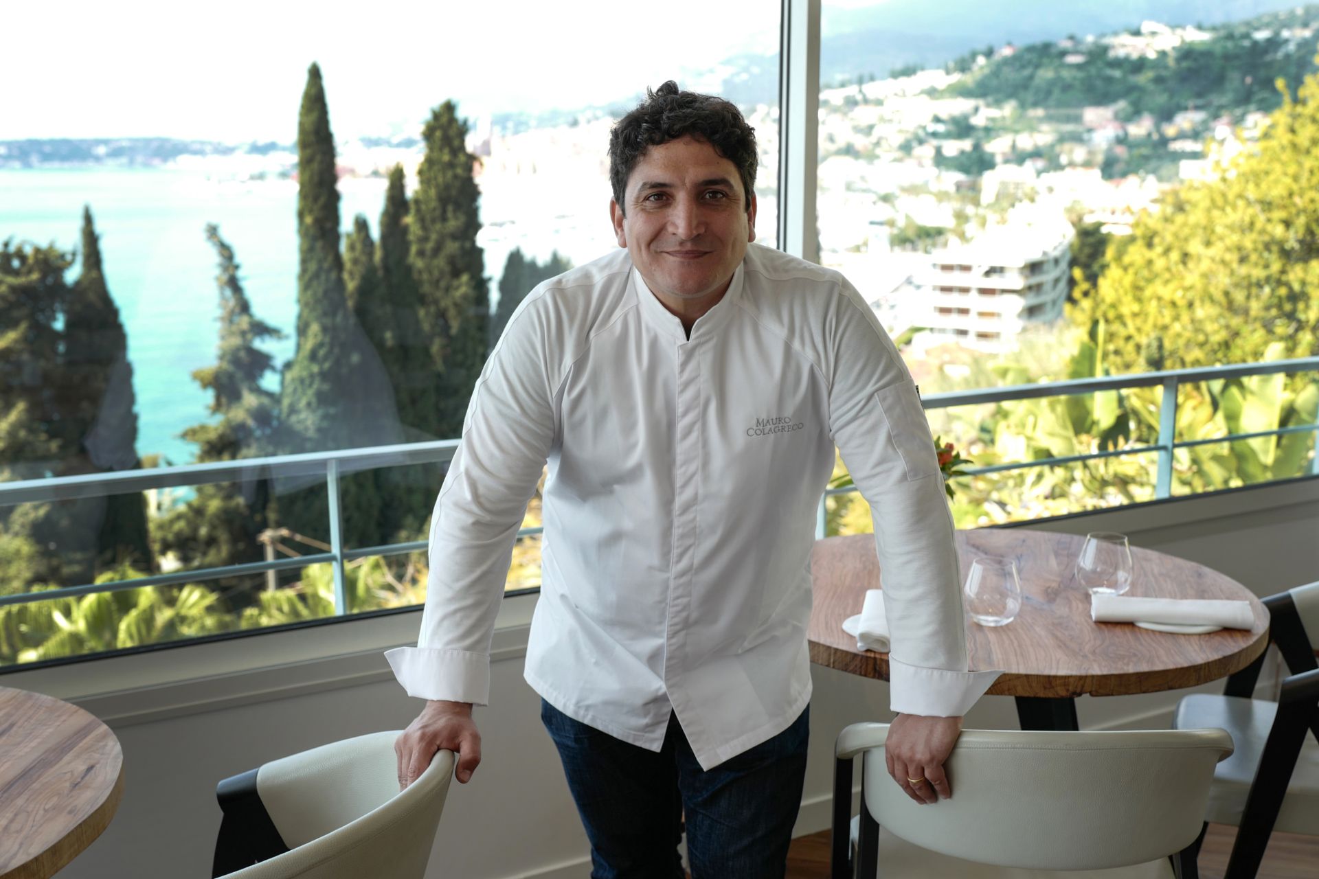 Italian-Argentinian chef Mauro Colagreco poses for a photo session in the "Mirazur" restaurant on the French riviera city of Menton on April 13, 2019. - Mauro Colagreco was awarded three Michelin stars on January 21, 2019. (Photo by VALERY HACHE / AFP)