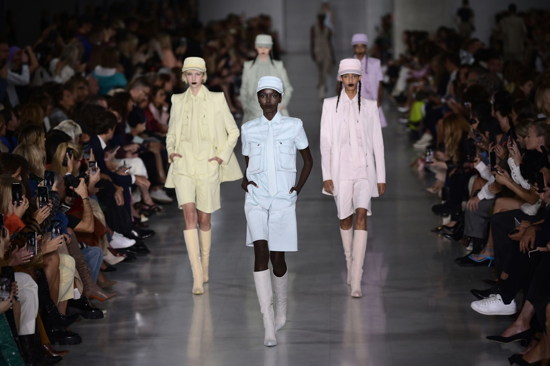 Models present creations during the Max Mara Spring/Summer 2020 fashion show on September 19, 2019 in Milan. (Photo by MARCO BERTORELLO / AFP)