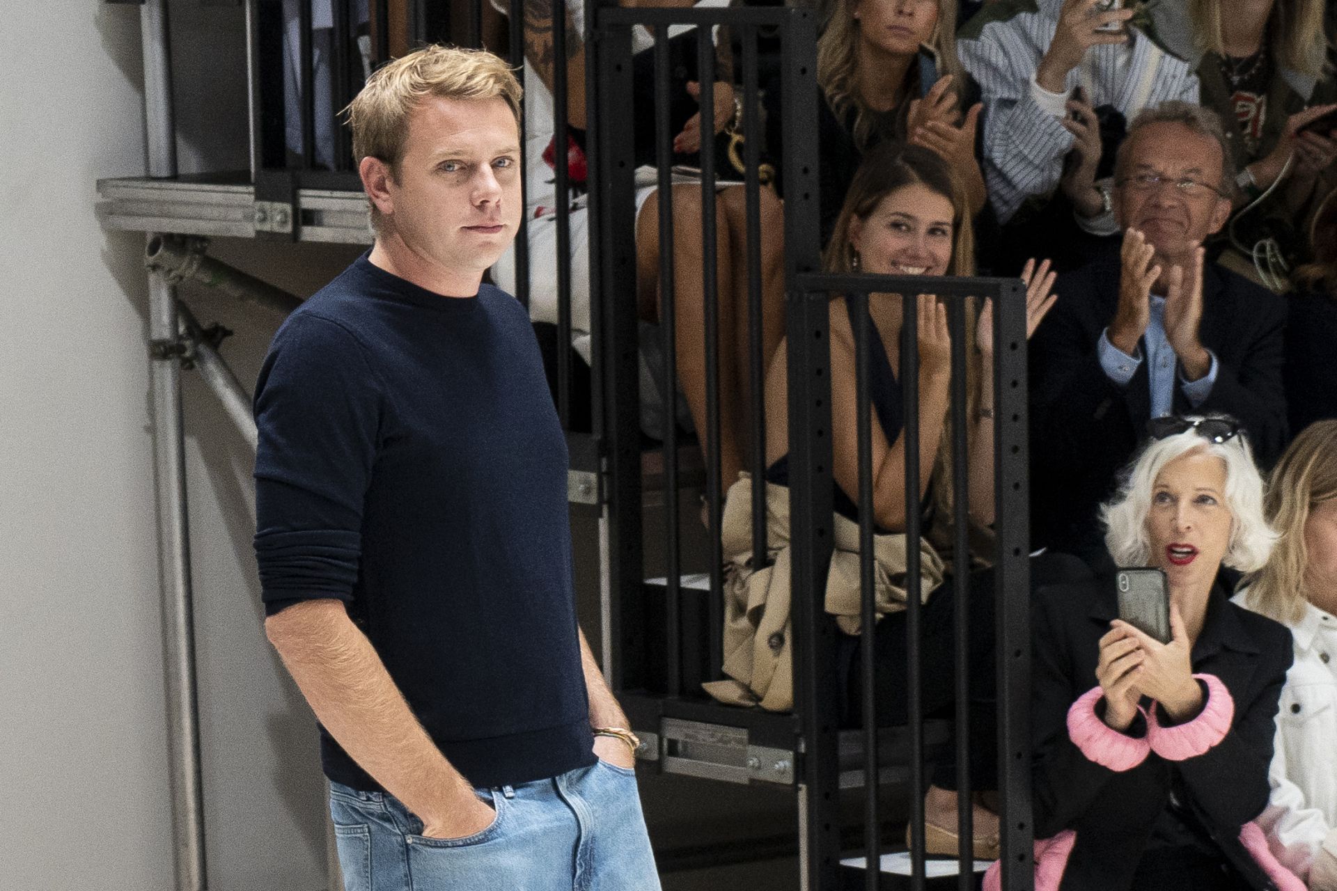 Northern Irish designer JW Anderson ackknowledges the crowd after his catwalk show for the Spring/Summer 2020 collection on the fourth day of London Fashion Week in London on September 16, 2019. (Photo by Niklas HALLE'N / AFP)