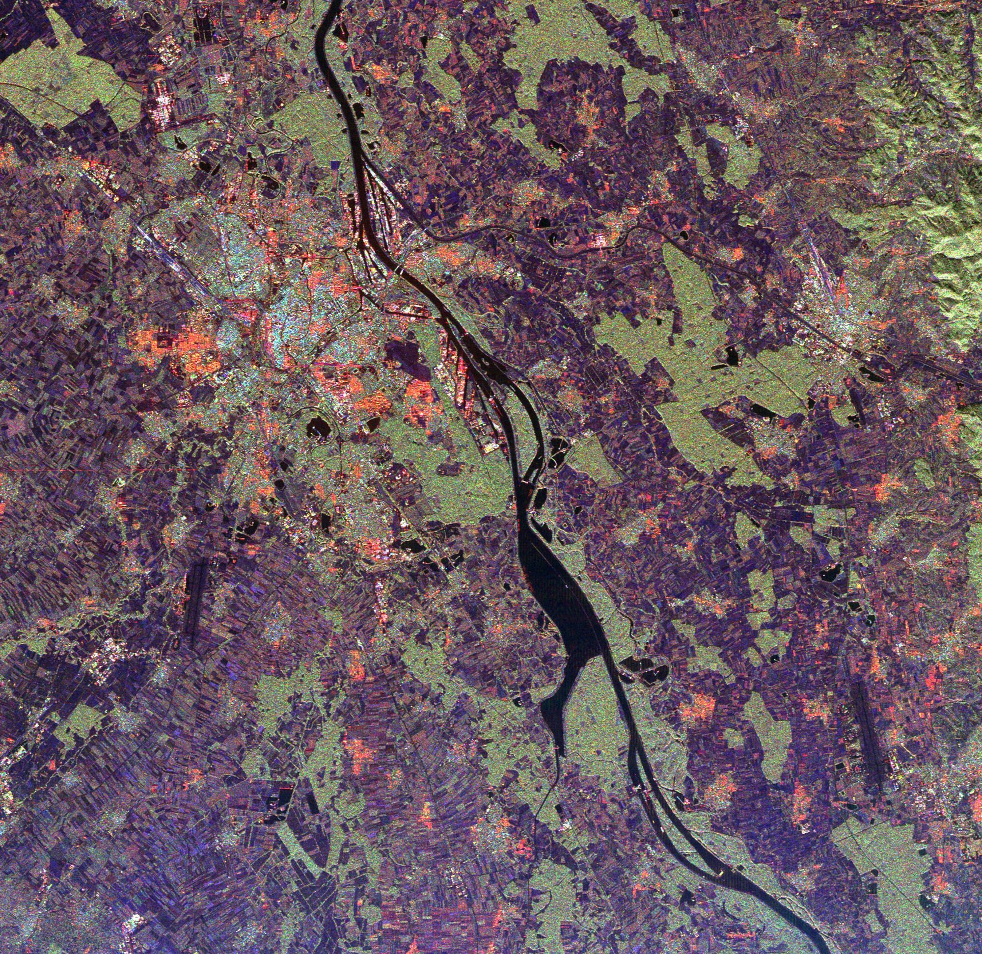 The Rhine River serving as a border between the Alsace region of northeastern France (left) and the Black Forest region of Germany (right). | Photo from NASA