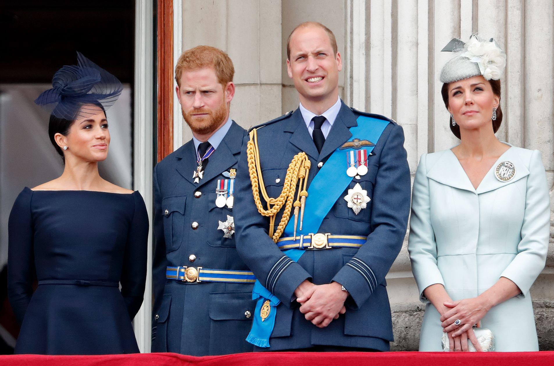 LONDON, UNITED KINGDOM - JULY 10: (EMBARGOED FOR PUBLICATION IN UK NEWSPAPERS UNTIL 24 HOURS AFTER CREATE DATE AND TIME) Meghan, Duchess of Sussex, Prince Harry, Duke of Sussex, Prince William, Duke of Cambridge and Catherine, Duchess of Cambridge watch a flypast to mark the centenary of the Royal Air Force from the balcony of Buckingham Palace on July 10, 2018 in London, England. The 100th birthday of the RAF, which was founded on on 1 April 1918, was marked with a centenary parade with the presentation of