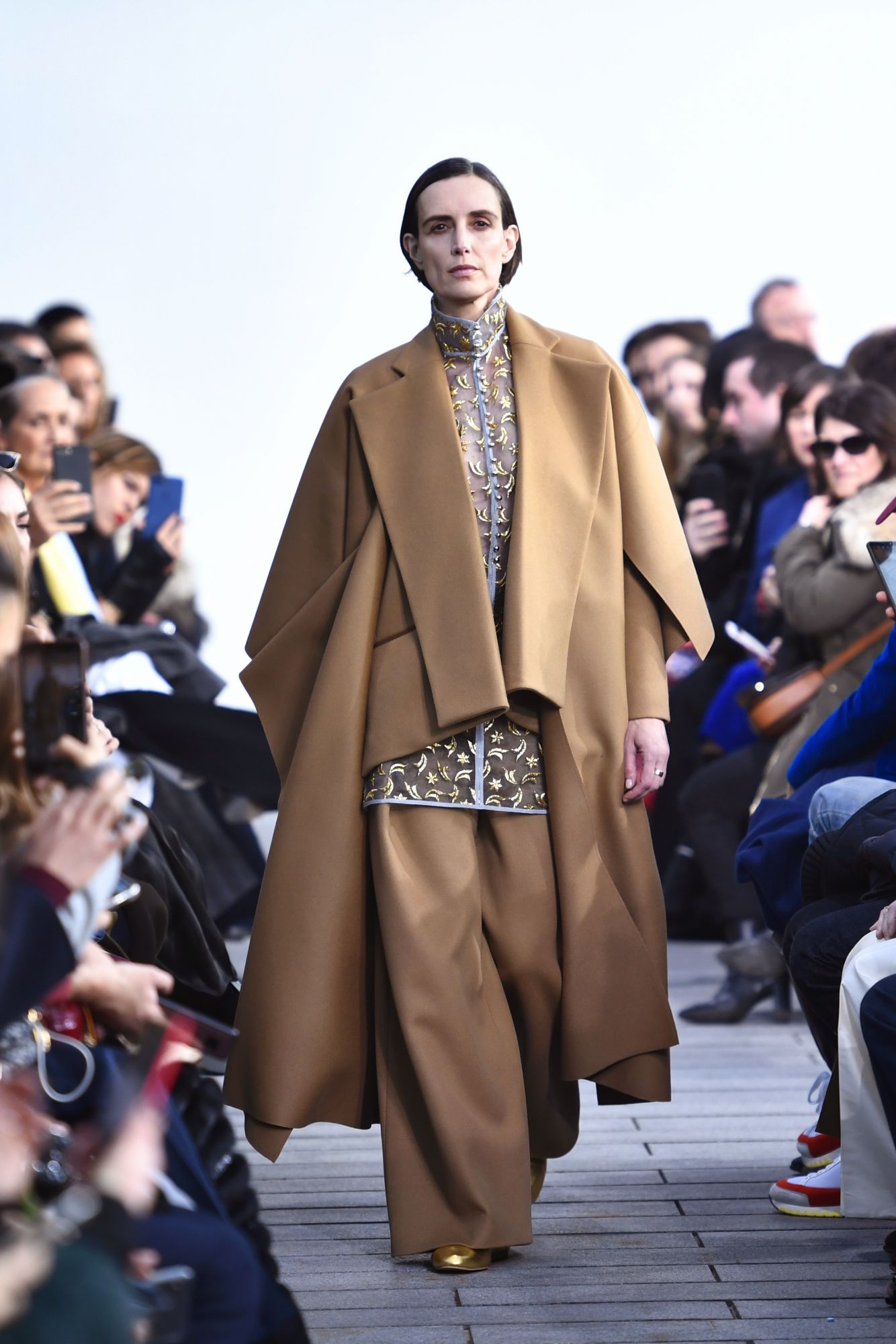 Gold was also present at Maison Rabih Kayrouz in embroidery work on transparent backing, which offered the ultimate in delicacy and refinement. Paris, January 21, 2019; Image: Courtesy of Stephane de Sakutin/AFP