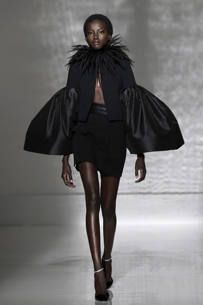 Givenchy presented couture as architecture with plays on volume like these puff sleeves and unexpected combinations of fabrics