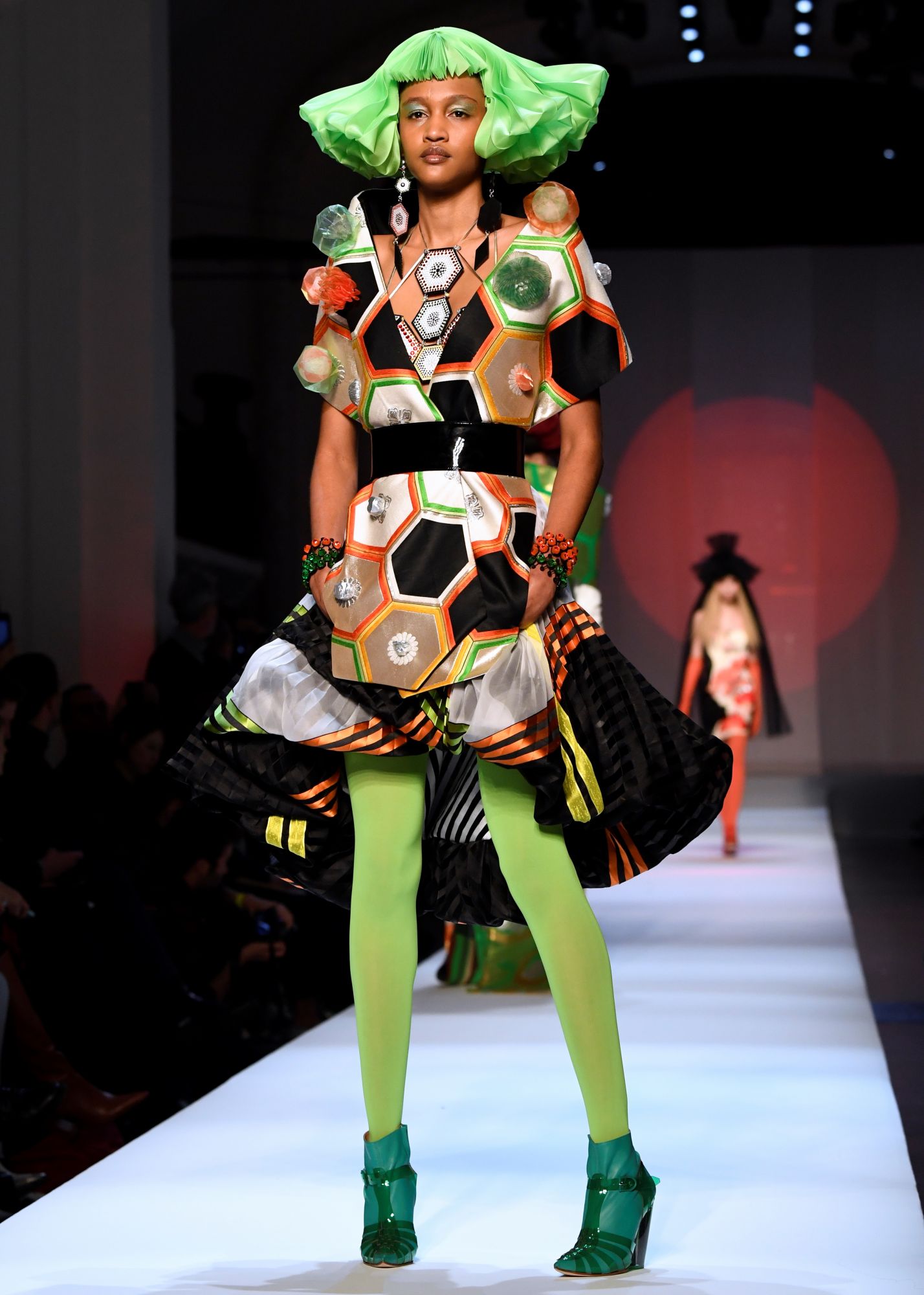 Japan was also a theme for Jean Paul Gaultier, who presented airy silhouettes that toyed with pleats and graphic motifs and cuts.