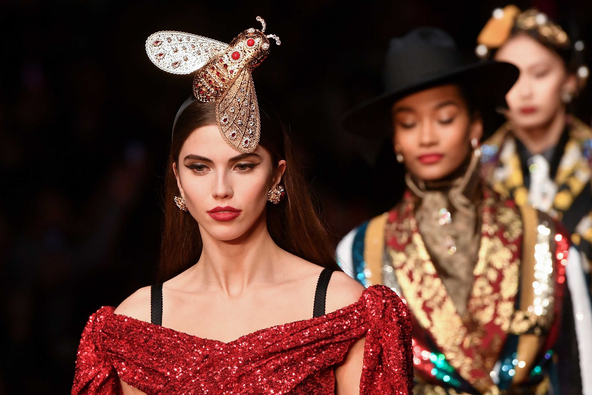 A model presents a creation during the Dolce & Gabbana women's Autumn/Winter 2019/2020 collection fashion show, on February 24, 2019 in Milan. (Photo by Marco BERTORELLO / AFP)