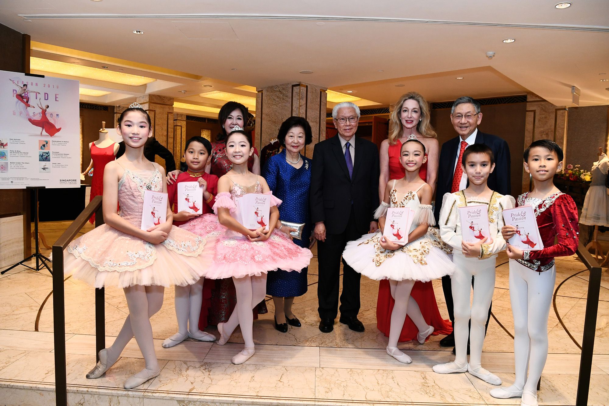 Laura Hwang, Mary Tan, Tony Tan Keng Yam, Paige Parker and Michael Hwang with young dancers from the Singapore Ballet Academy