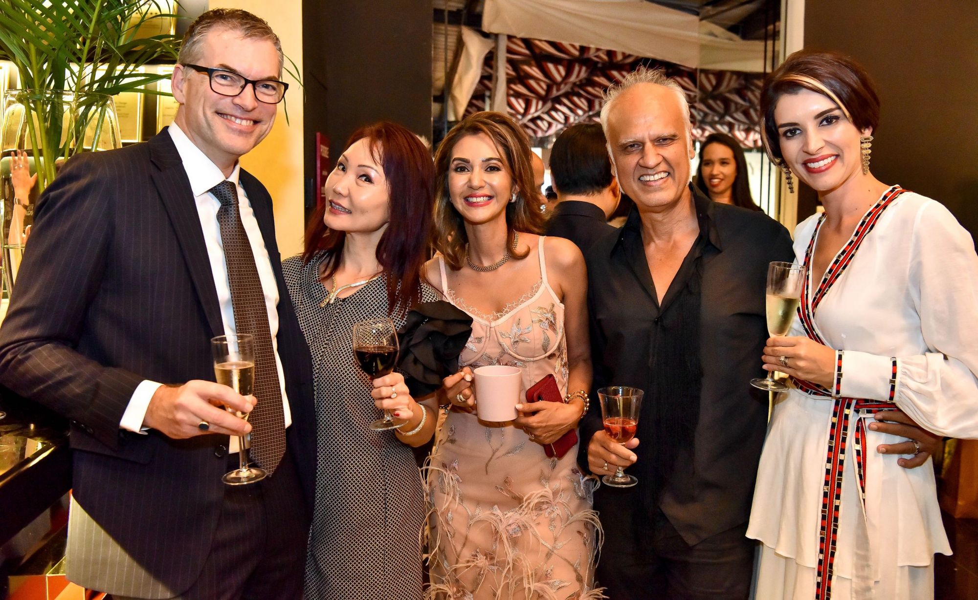Oscar Wezenbeek, Angela Tan, Nikki Hunt, Riaz Mehta, Andrea Savage