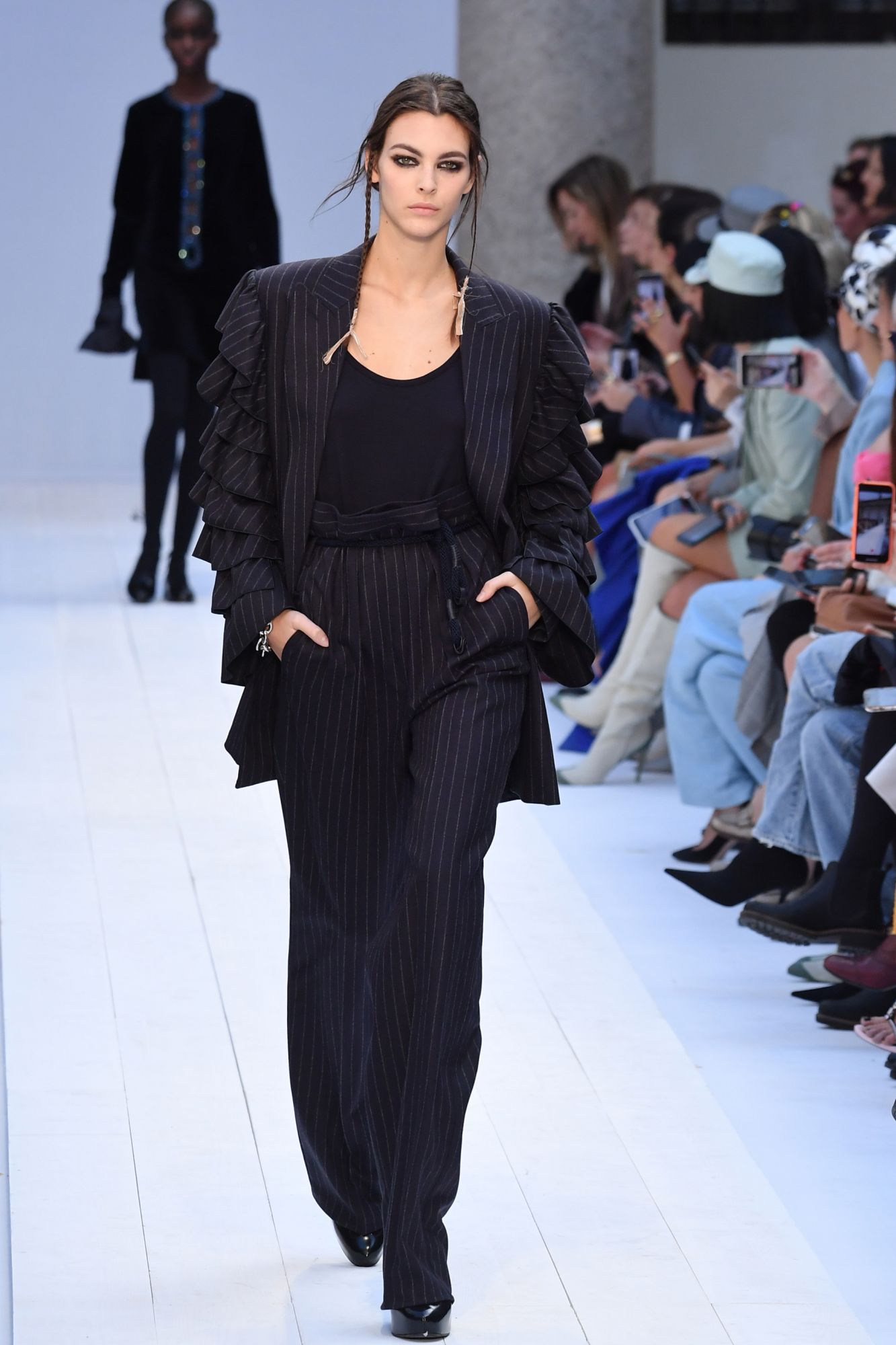 Italian model Vittoria Ceretti presents a creation for Max Mara's Women Fall - Winter 2020 fashion collection on February 20, 2020 in Milan. (Photo by Andreas SOLARO / AFP)
